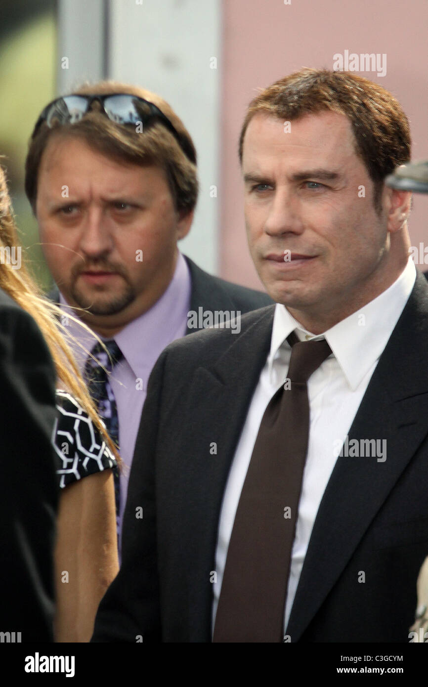 John Travolta leaving court after giving his testimony in the ongoing extortion trial. Paramedic Tarino Lightbourn and former Stock Photo