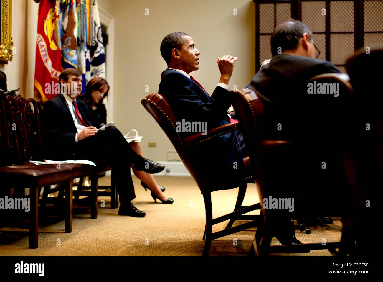 President Barack Obama talks during a briefing with advisors in the ...