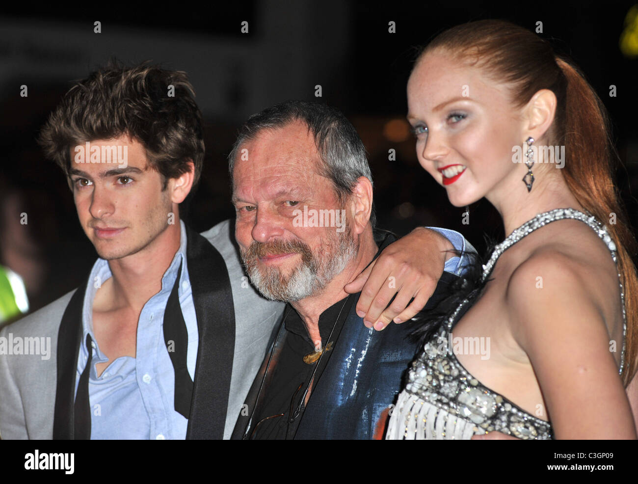 Andrew Garfield, Terry Gilliam and Lily Cole The Imaginarium of Doctor  Parnassus - UK film premiere held at the Empire Stock Photo - Alamy, image size:1300x986
