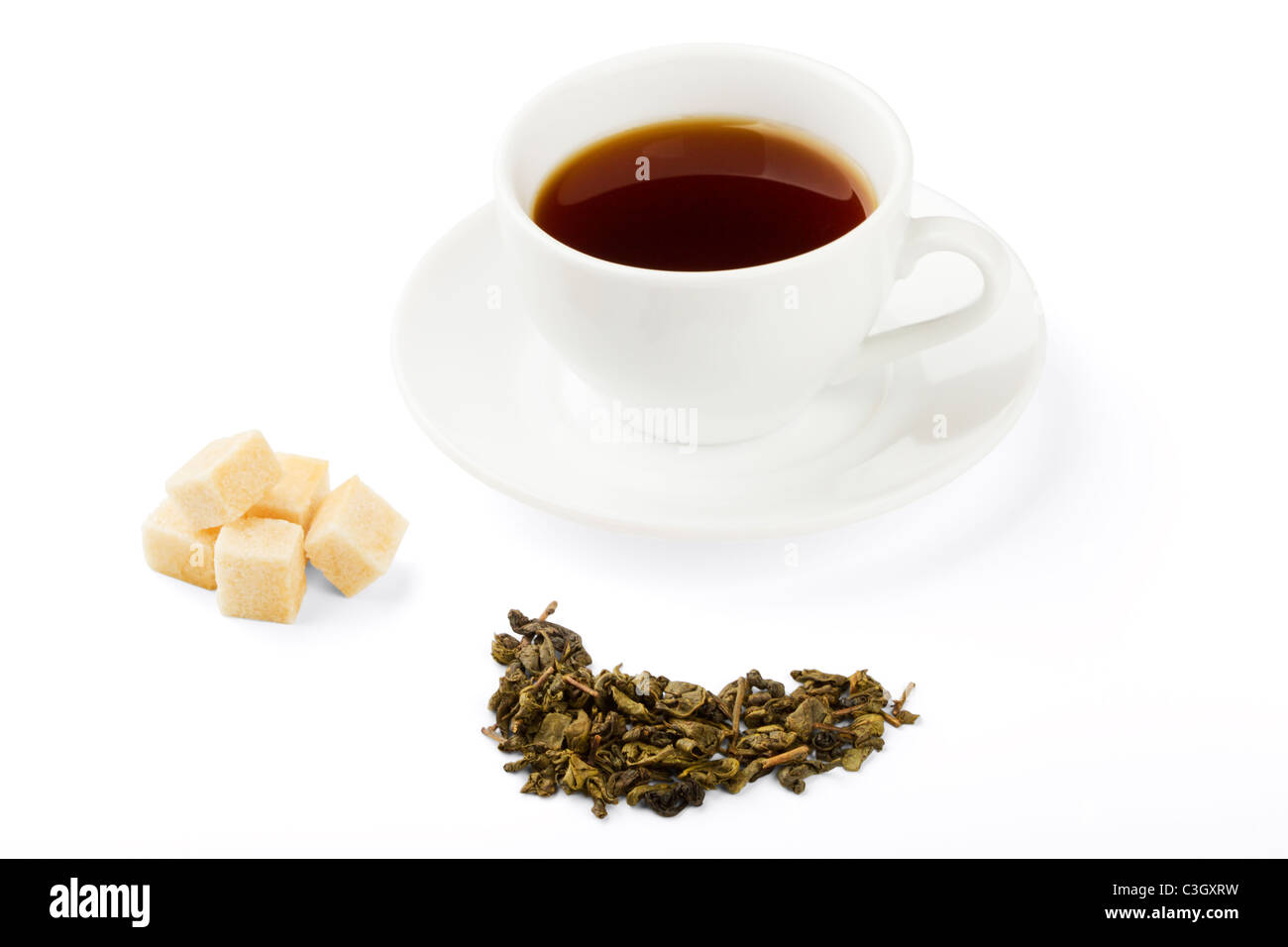 black tea, sugar, dried tea leaves isolated on a white background Stock