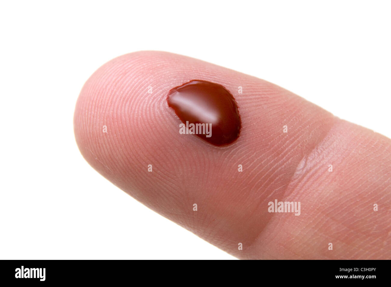 Blood on finger tip from blood test pin prick Stock Photo Alamy