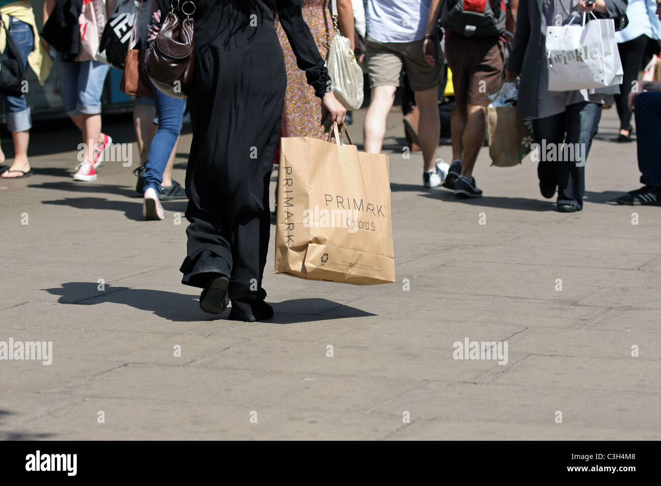 Shopping bag being carried by a female in Oxford Street, London