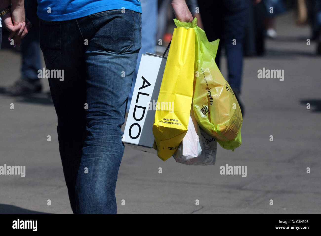 Carrying aldo shopping bags hi-res stock photography and images - Alamy