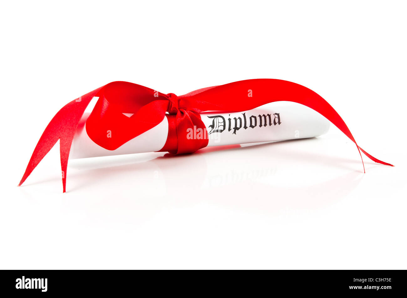 Diploma with red ribbon on white background Stock Photo