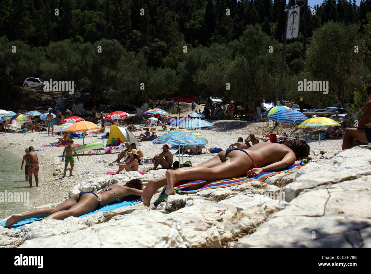 Sunbathing near the village of Fiscardo, Kefalonia, Greece. Stock Photo