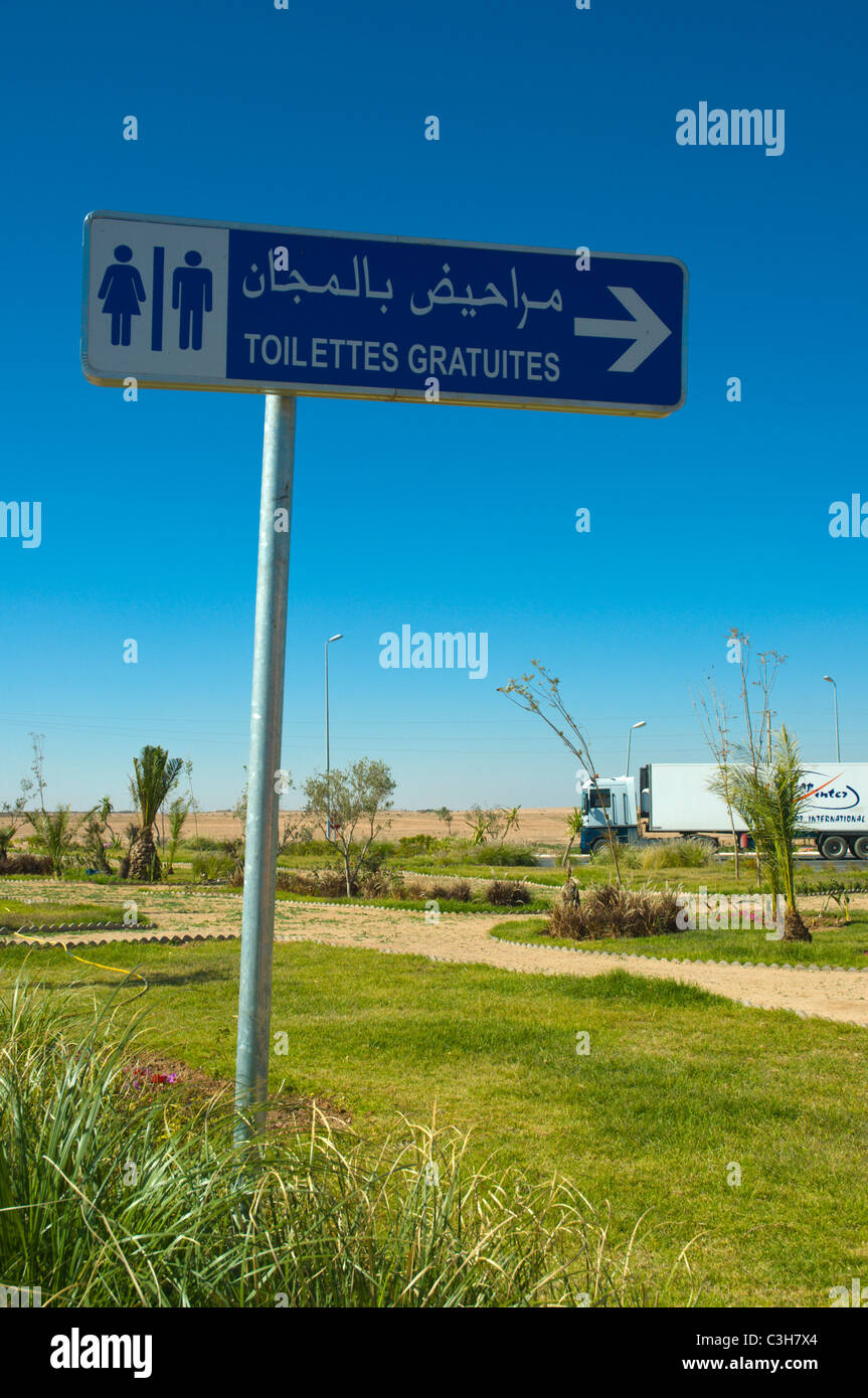 Sign indicating toilets at a rest stop along motorway near Marrakech central Morocco northern Africa Stock Photo
