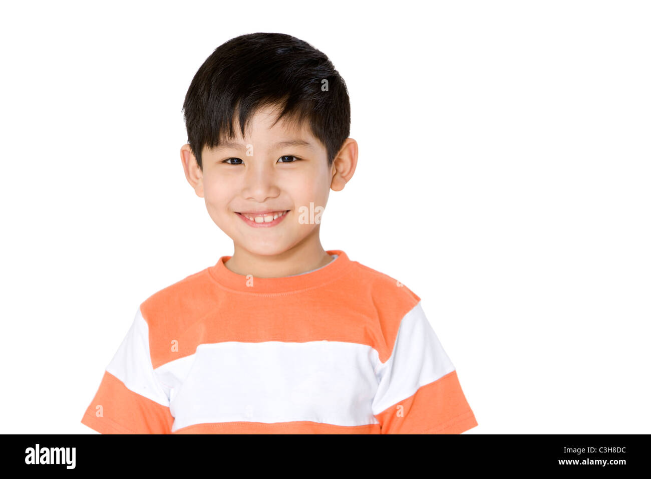 Portrait of a smiling young boy Stock Photo - Alamy