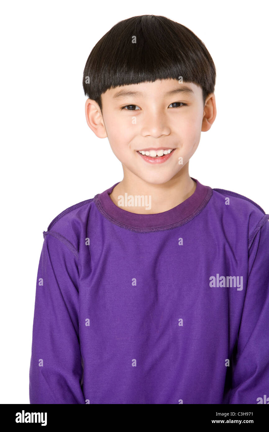 Portrait of a smiling young boy Stock Photo - Alamy