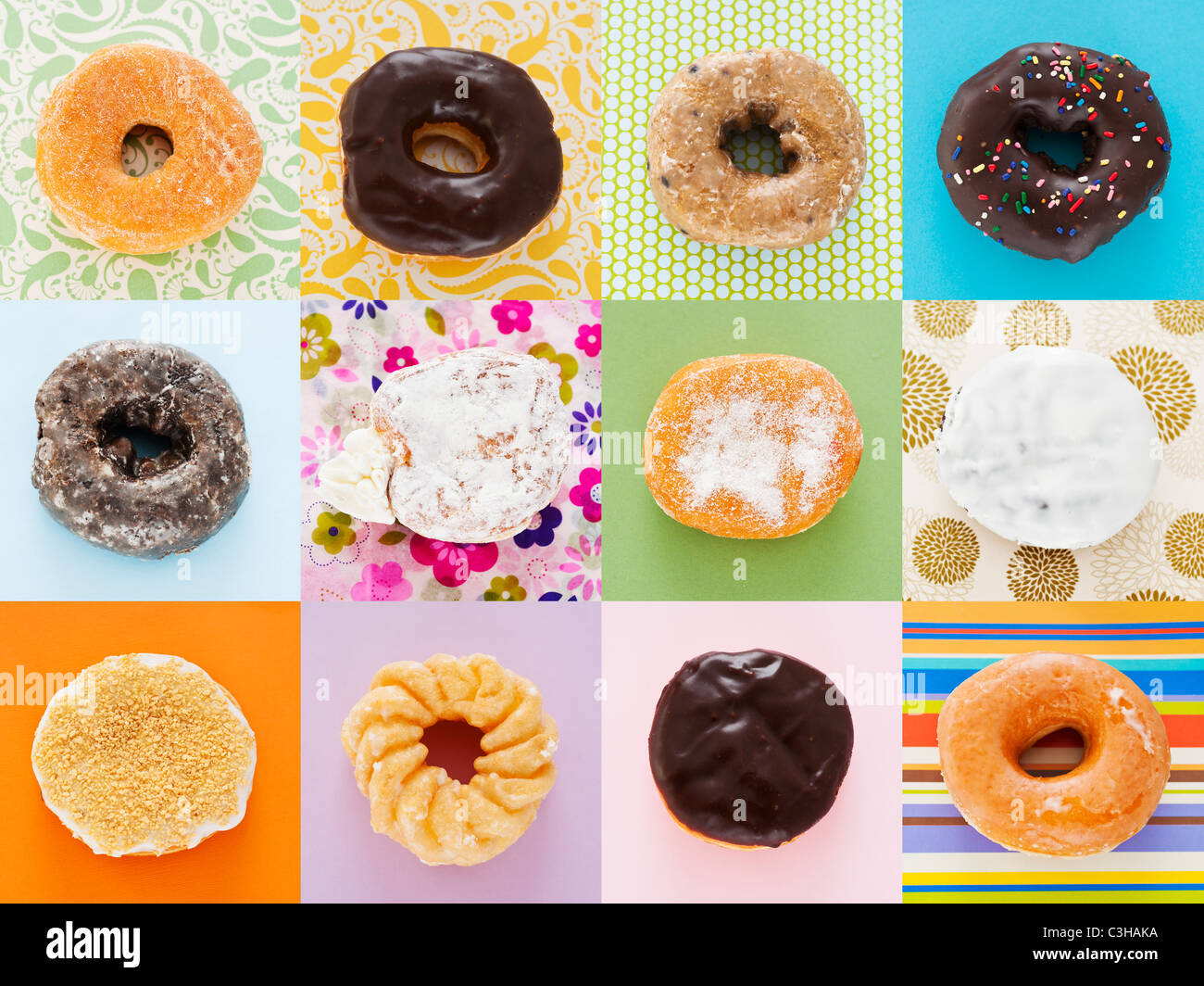 Selection of doughnuts on colorful background Stock Photo