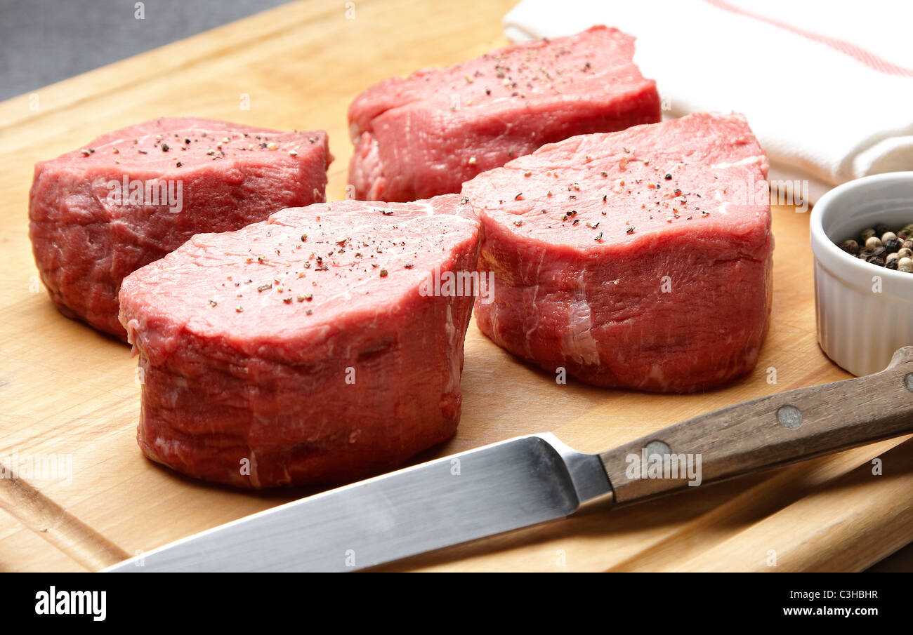 Raw Steaks Stock Photo