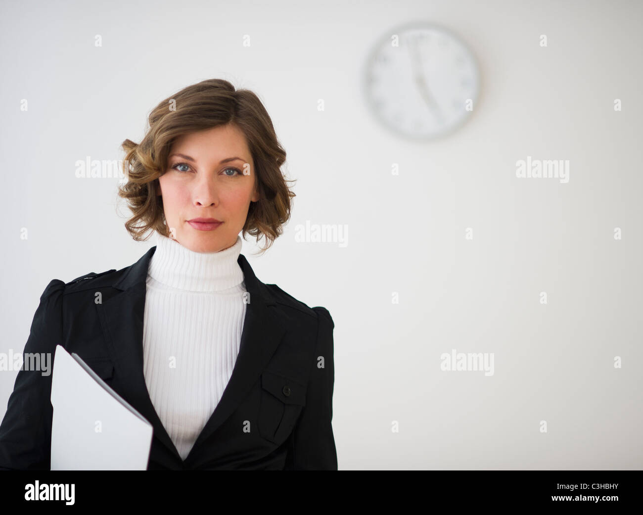 Portrait of businesswoman in office Stock Photo - Alamy