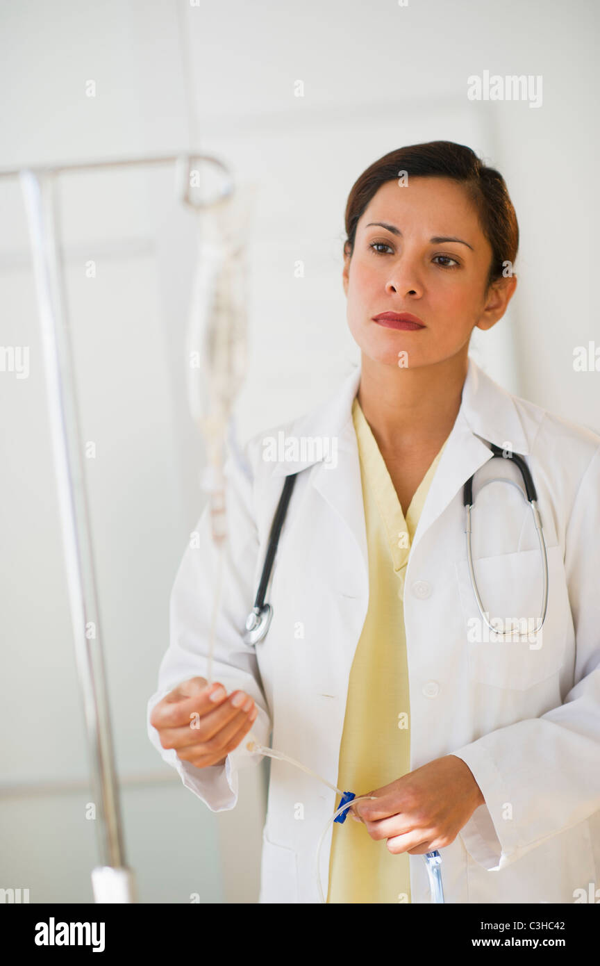 Female doctor with IV drip Stock Photo