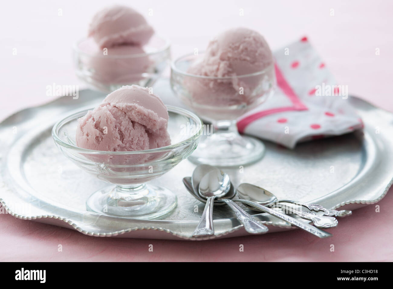 Close up of ice cream dessert on silver tray Stock Photo