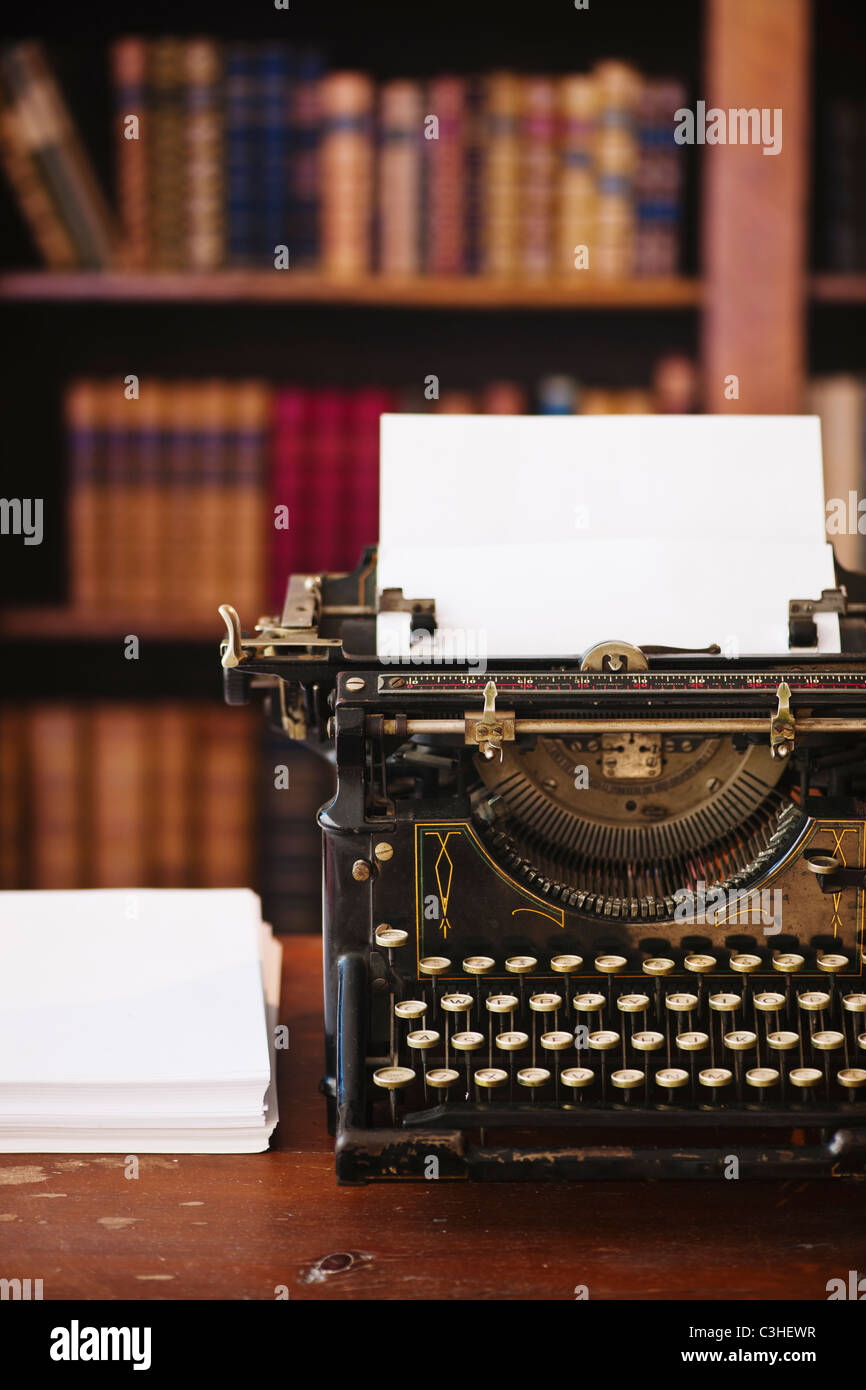 Antique typewriter in library Stock Photo Alamy