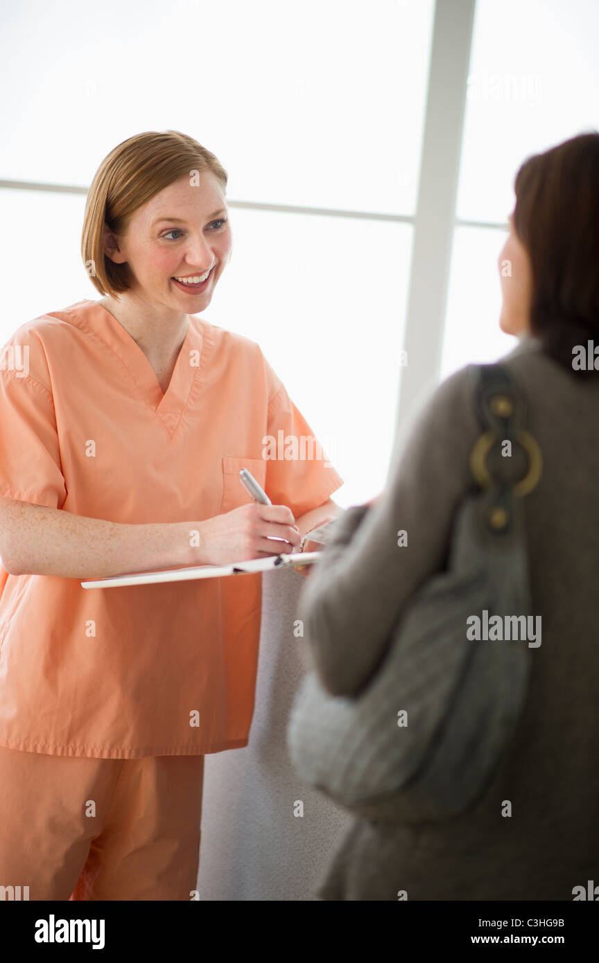 Female Nurse Talking With Patient Stock Photo Alamy