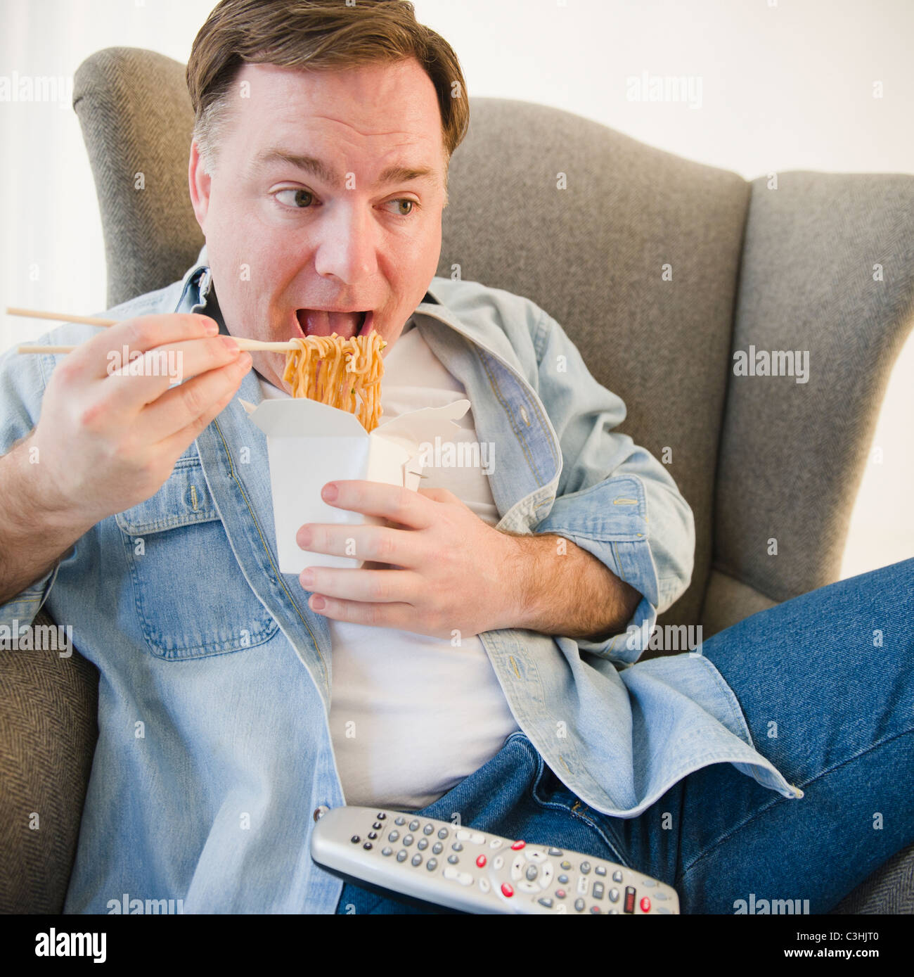 Couch Potato Eating Stock Photos Couch Potato Eating Stock