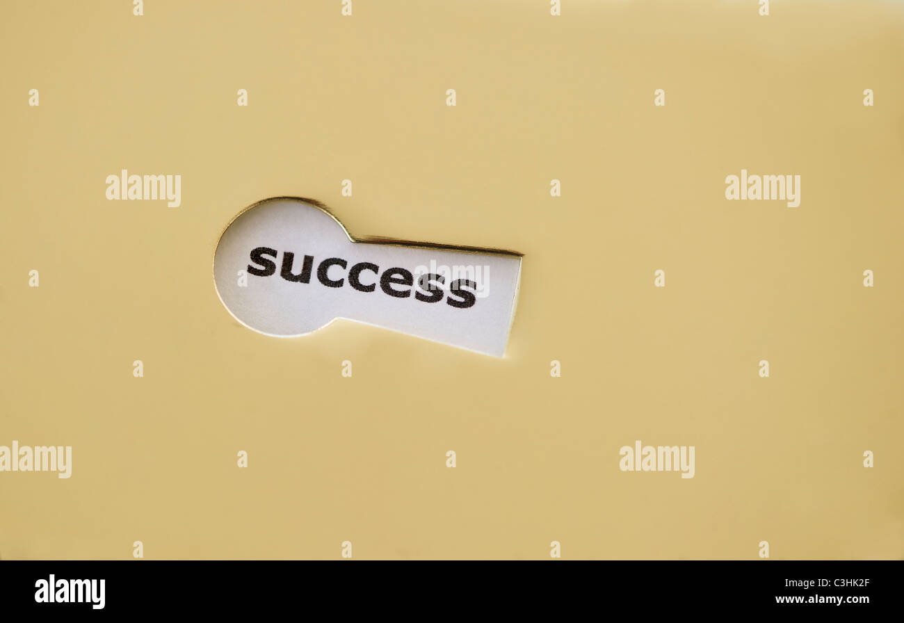 Studio shot of keyhole showing the word success Stock Photo