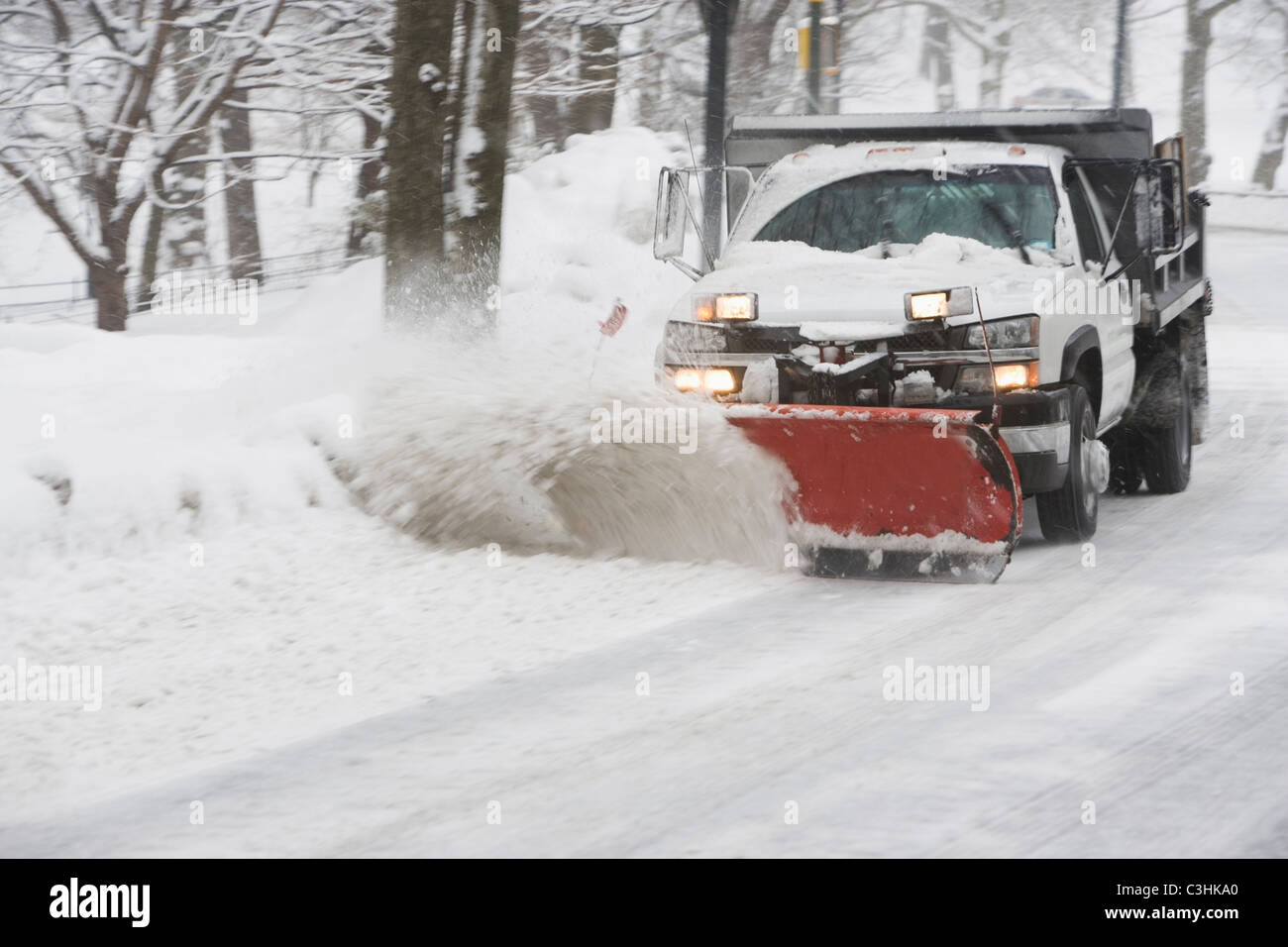 USA, New York City, snowplowing truck Stock Photo Alamy