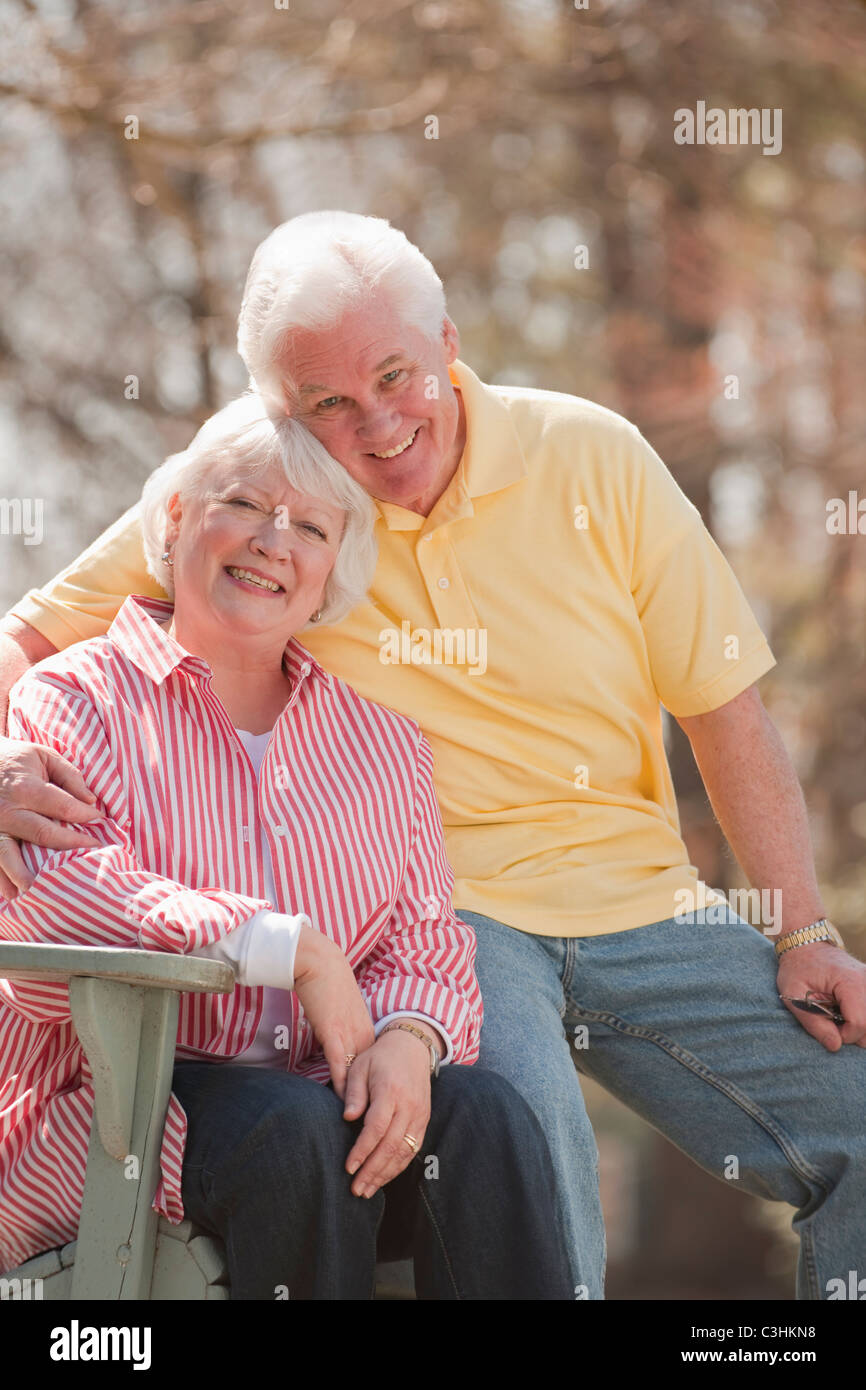 Portrait of senior couple in park Stock Photo - Alamy