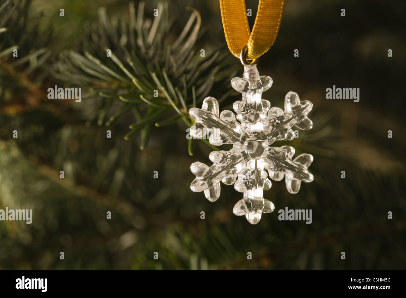 Close-up view of silver star hanging on Christmas tree Stock Photo - Alamy