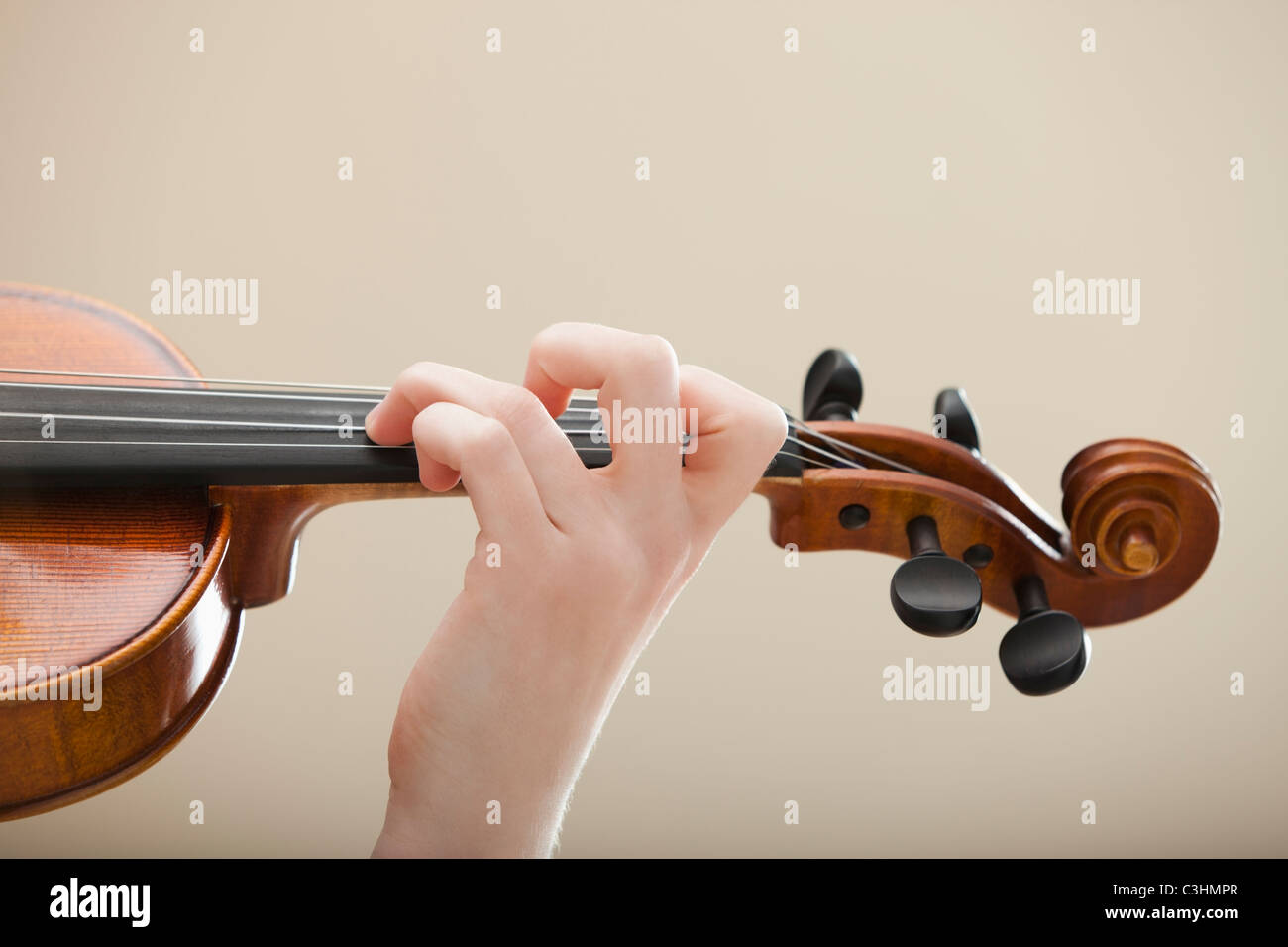 Young woman playing violin Stock Photo - Alamy