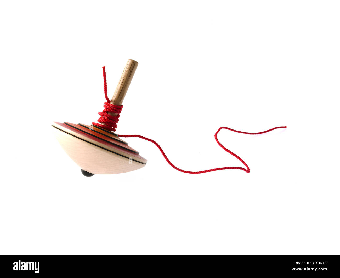 Spinning top on white background Stock Photo Alamy
