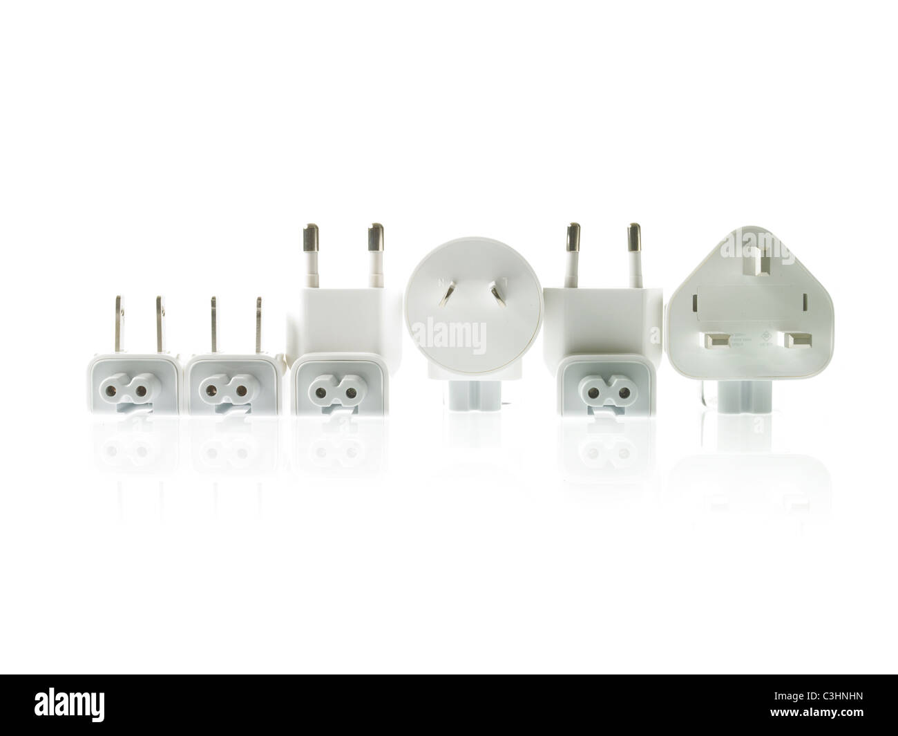 Row of plugs on white background Stock Photo