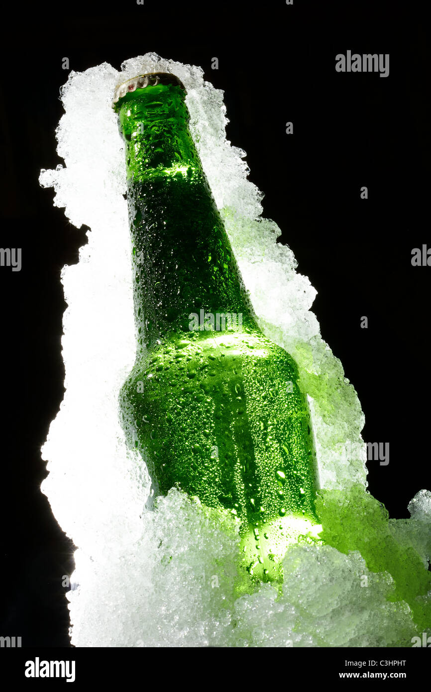 Close up view of the bottle in ice Stock Photo