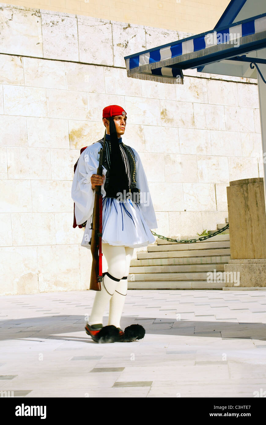ATHENS, GREECE - June 17: Evzones sitting on guard in front of the Greek Parliament on June 17, 2007 in Athens, Greece. Stock Photo
