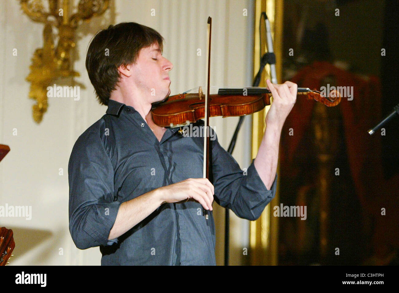 Joshua Bell performs at a Classical Music Student Workshop Concert in the East Room of the White House Washington DC, USA - Stock Photo