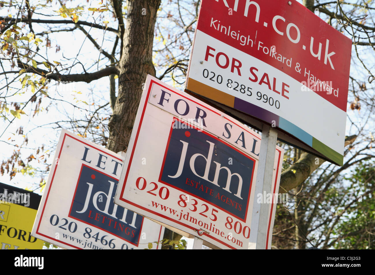 Estate agent property signs. Stock Photo