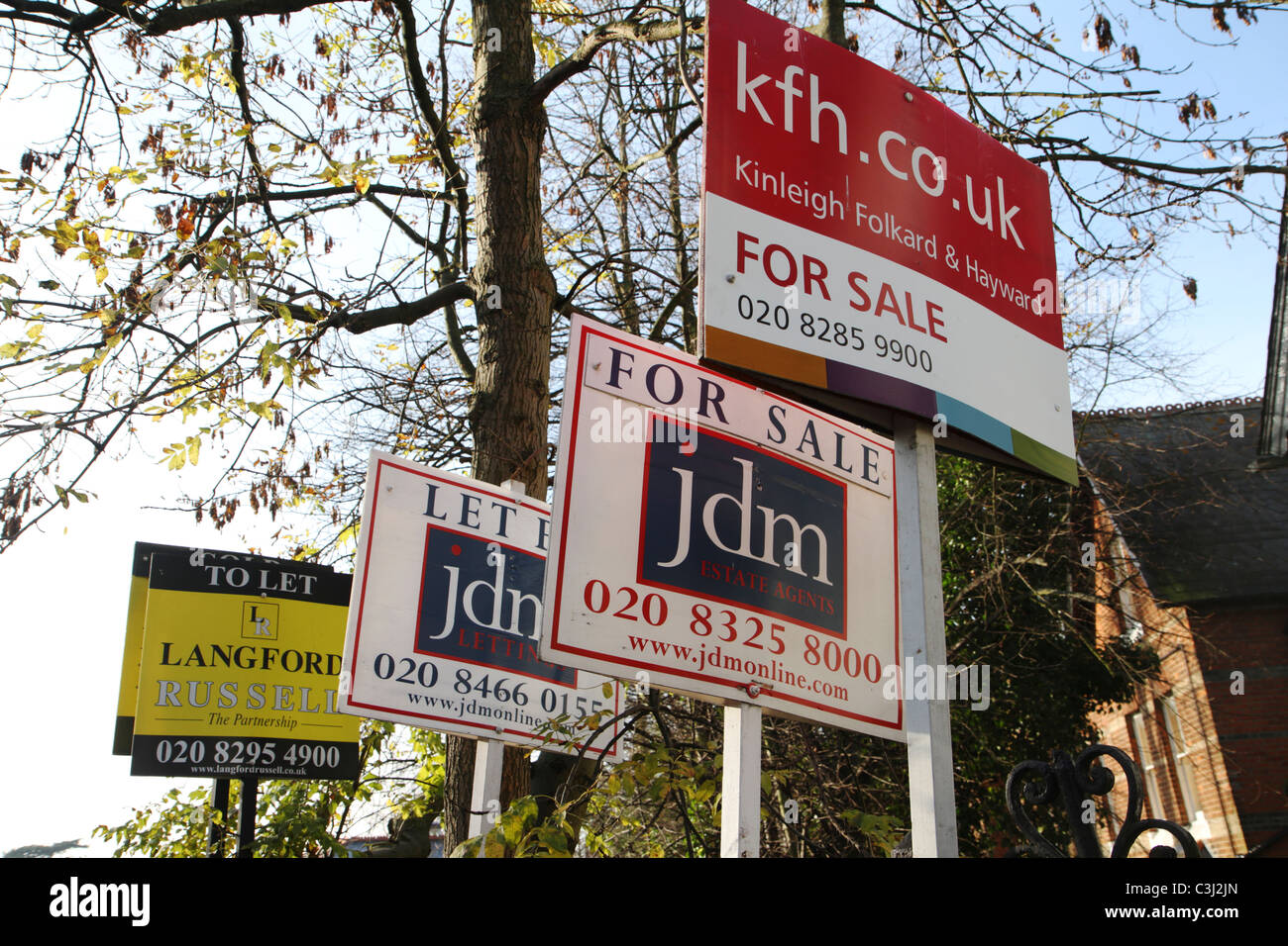 Estate agent property signs. Stock Photo
