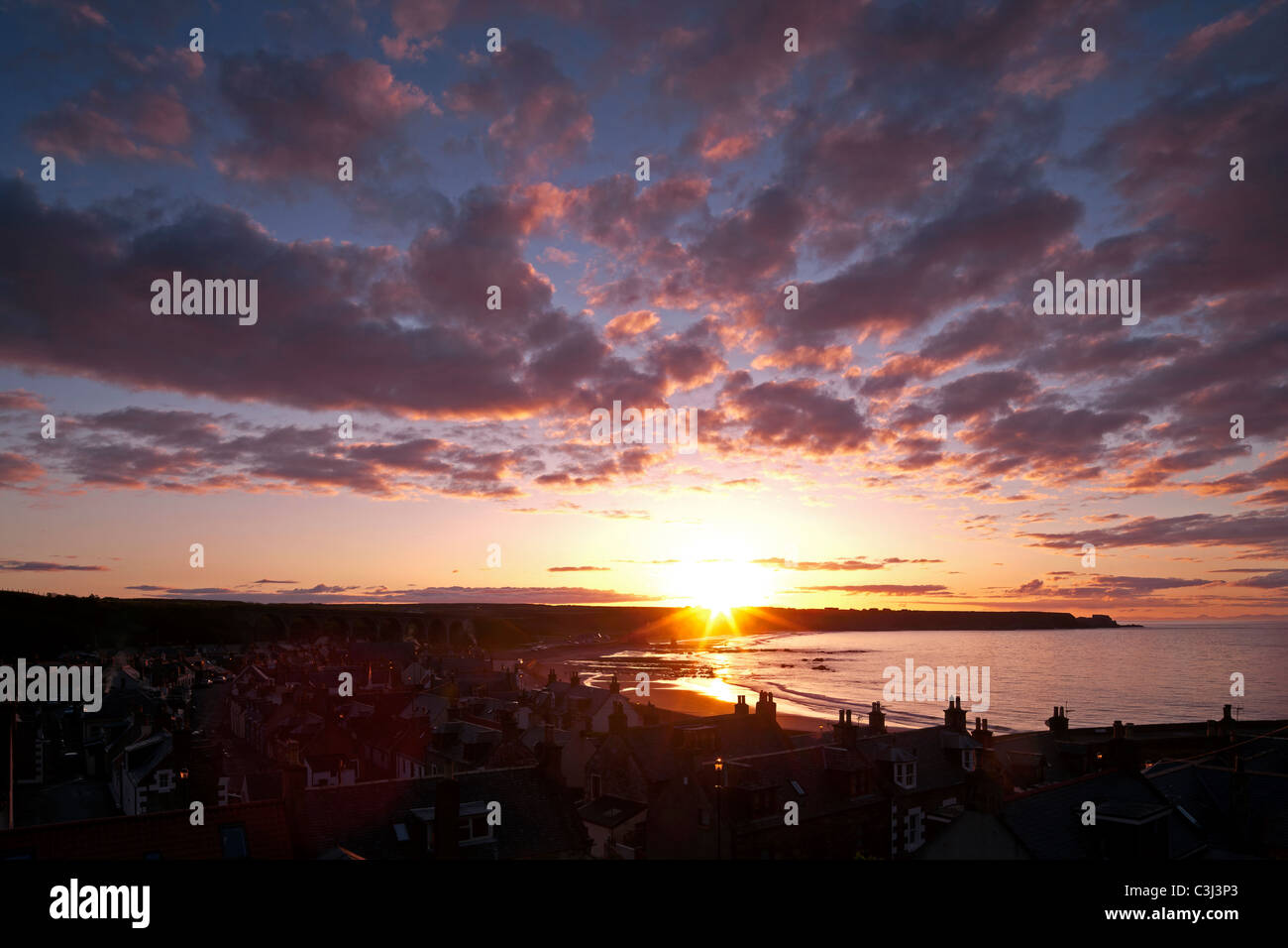 View over Cullen village and bay at sunset, Moray Firth, North East Scotland Stock Photo