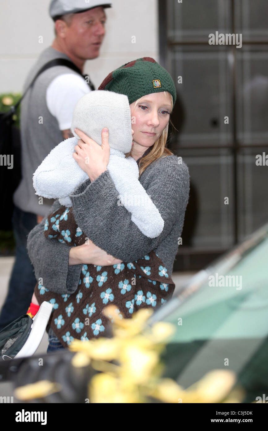 Anne Heche carrying her 9-month-old son Atlas while out in Manhattan ...