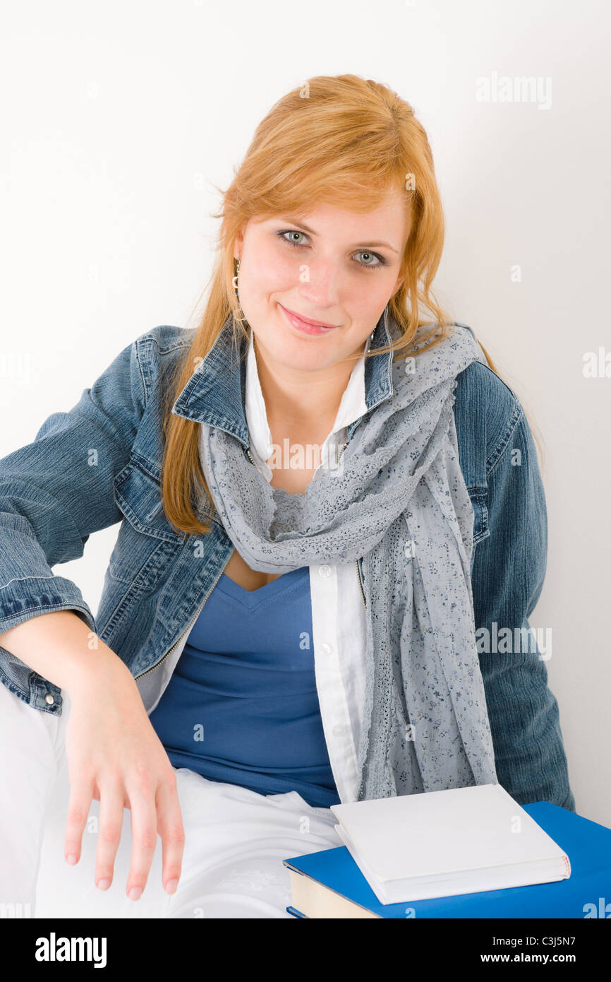 Student young happy woman portrait with book Stock Photo - Alamy