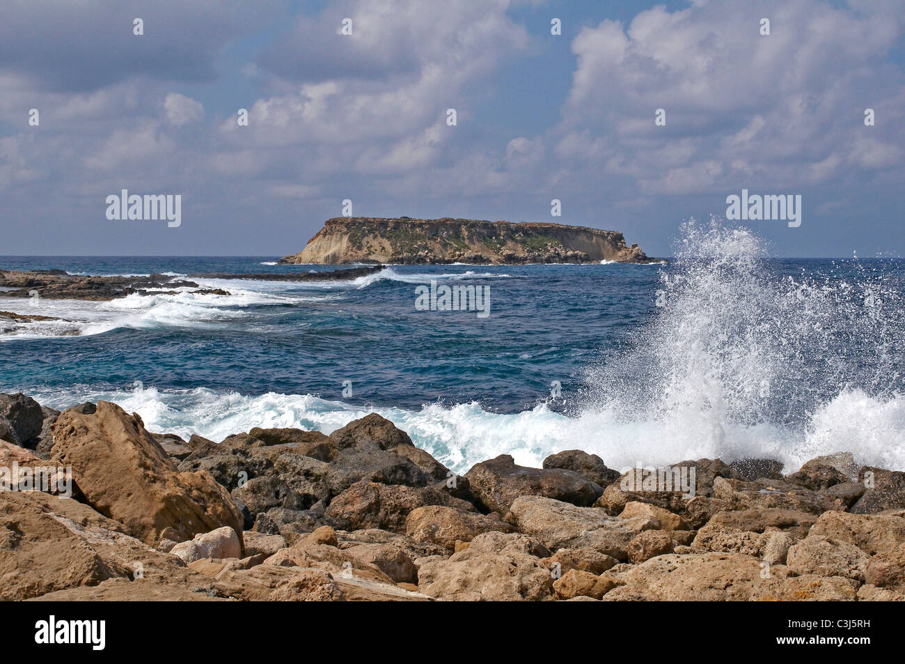 The coast line at Agios Georgios and Cape Drepano Stock Photo