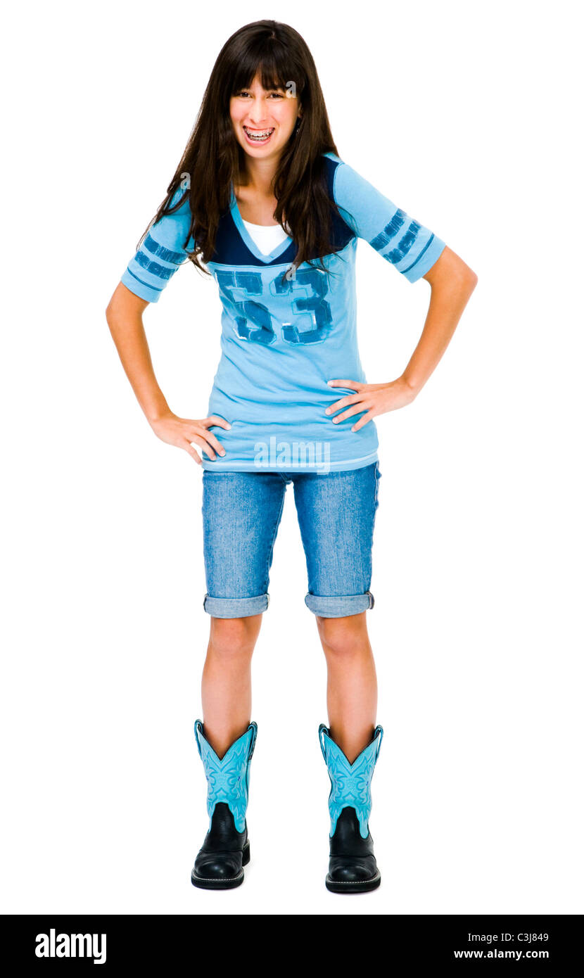 Portrait of a teenage girl posing and smiling isolated over white Stock ...