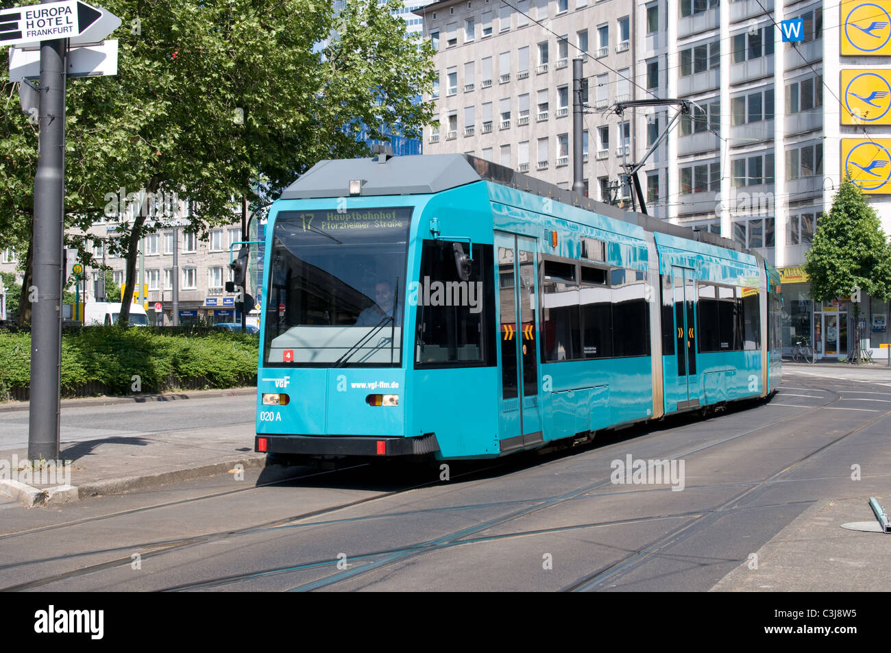 a modern low floor tram passes through the streets of Frank am main, Germany, near the main railway station. Stock Photo