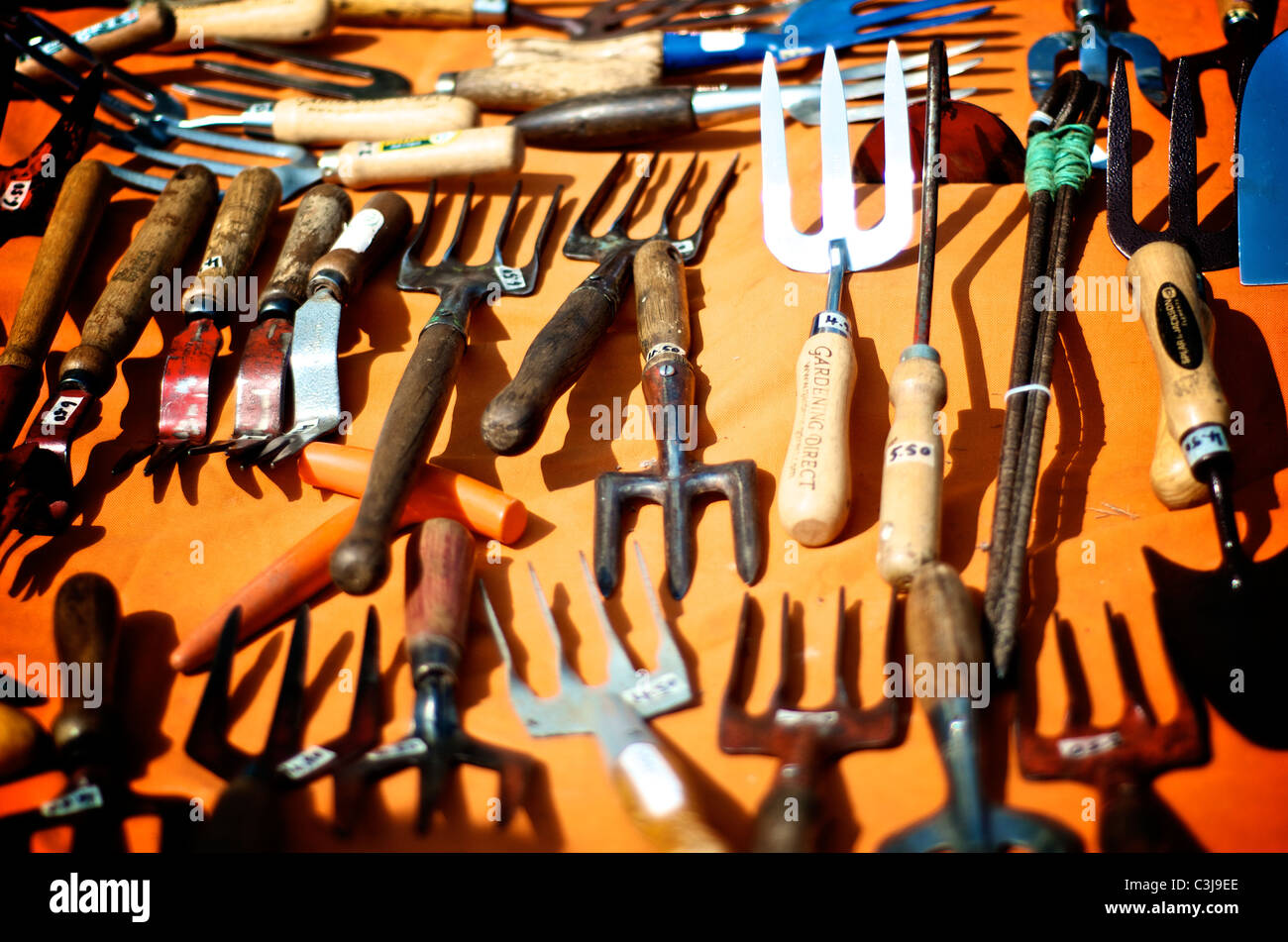 Vintage Garden Tools on colourful background Stock Photo