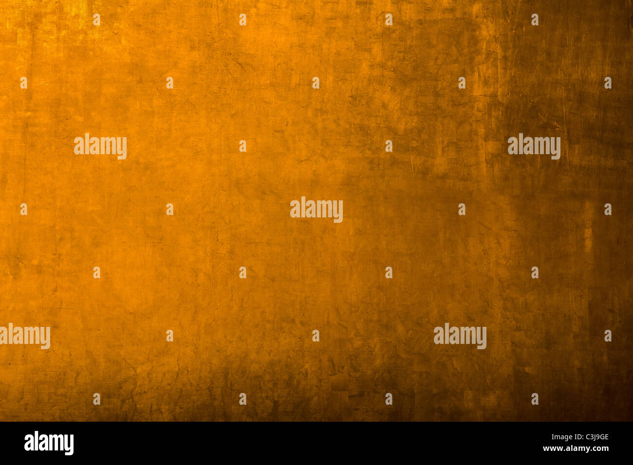 golden metallic background from wat pho temple buddha in bangkok, thailand Stock Photo