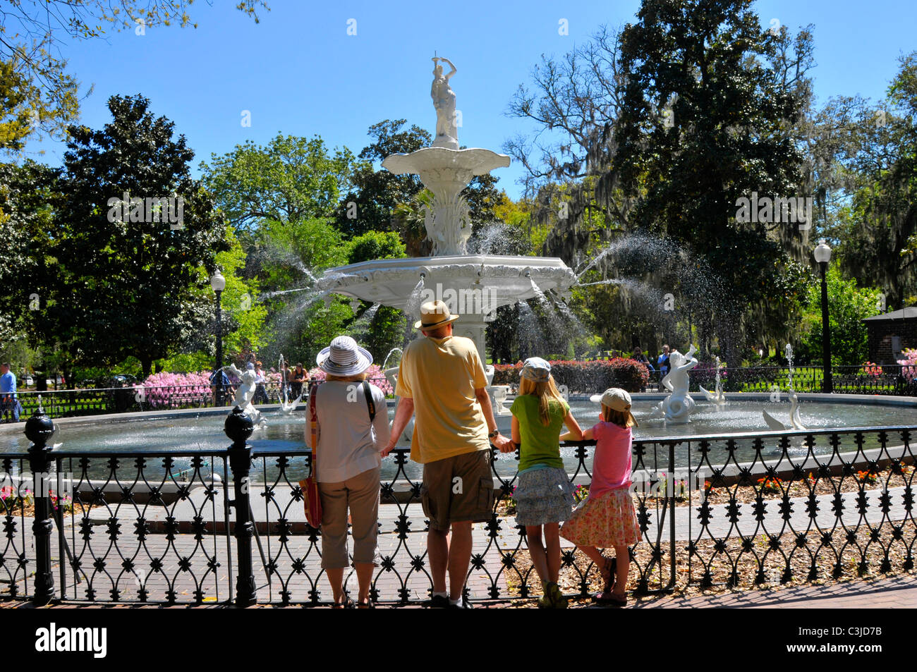 Family views Large water fountain in Forsyth Park in the historic district of Savannah Georgia Stock Photo