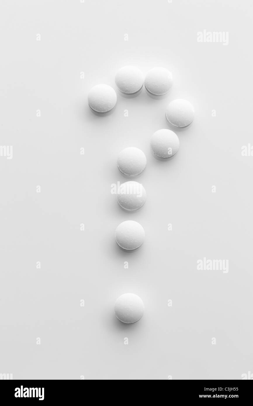 Tablets forming a question mark Stock Photo - Alamy