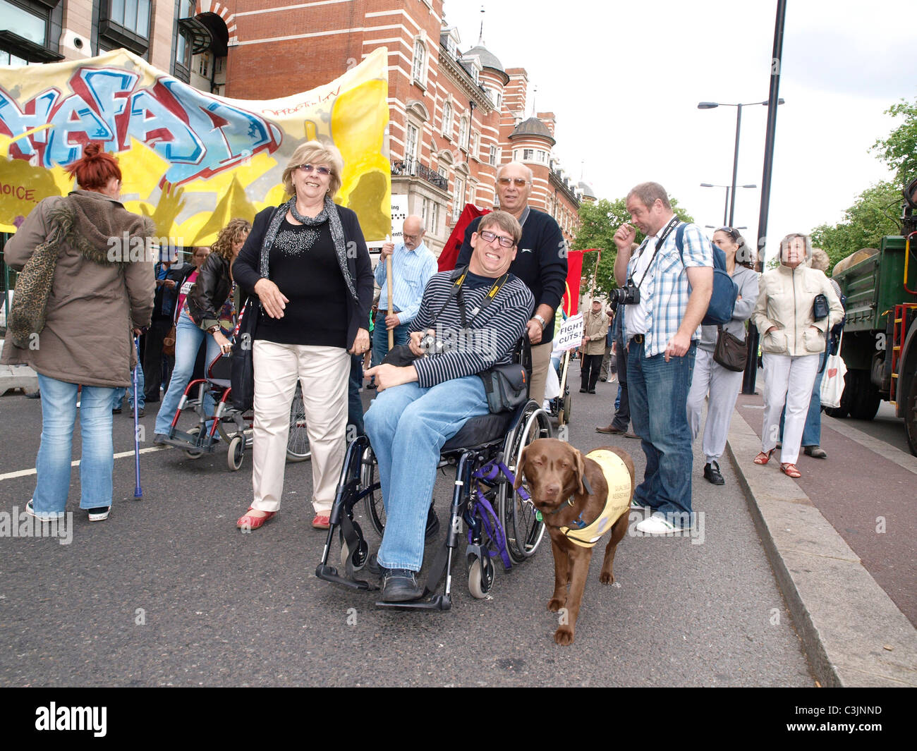 The Hardest Hit March Westminster London 2011. Disabled people and supporters march to demonstrate against public sector cuts. Stock Photo