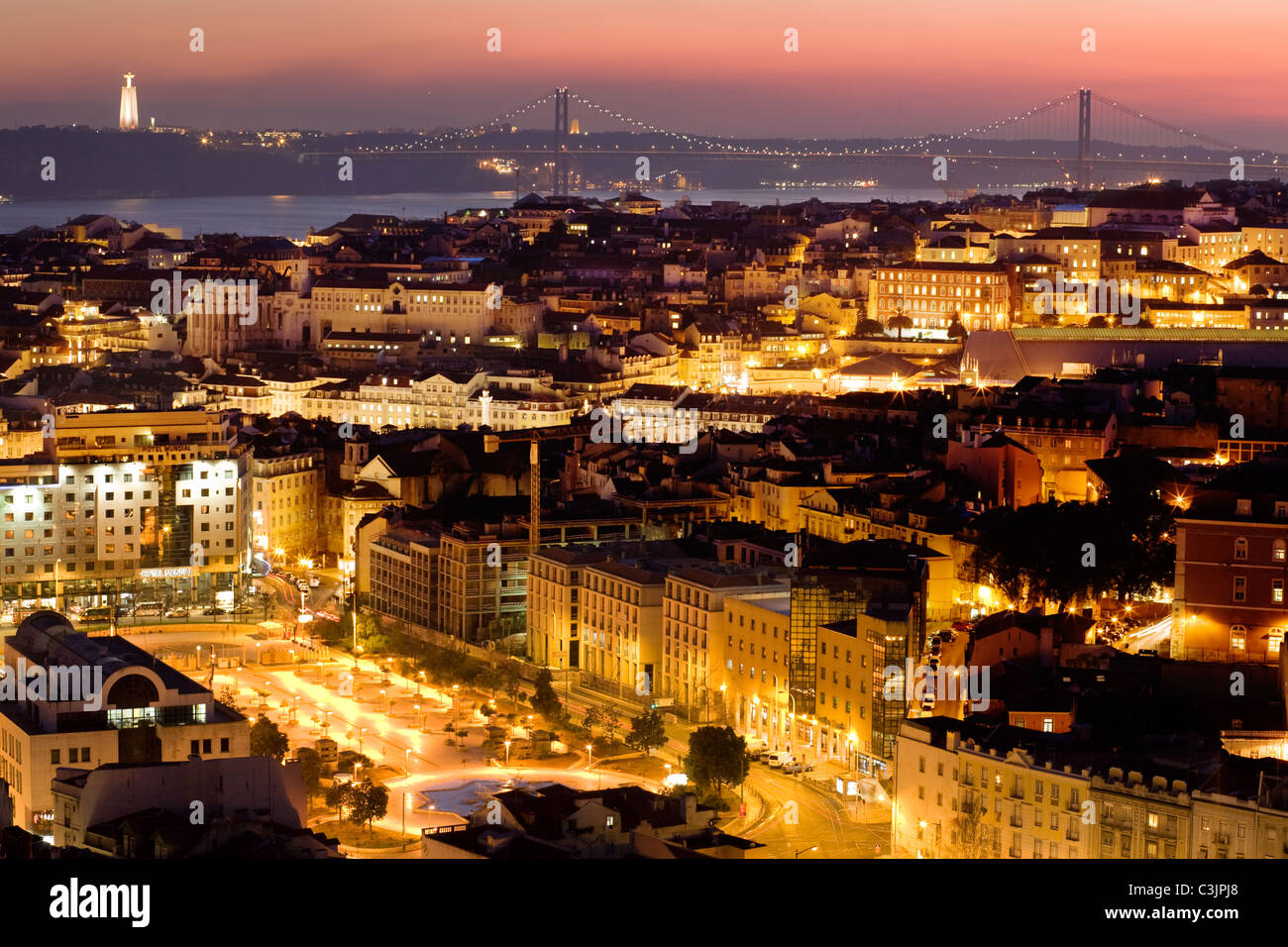Lisbon Portugal skyline showing Martin Moniz and April 25 Bridge over Tagus River Stock Photo