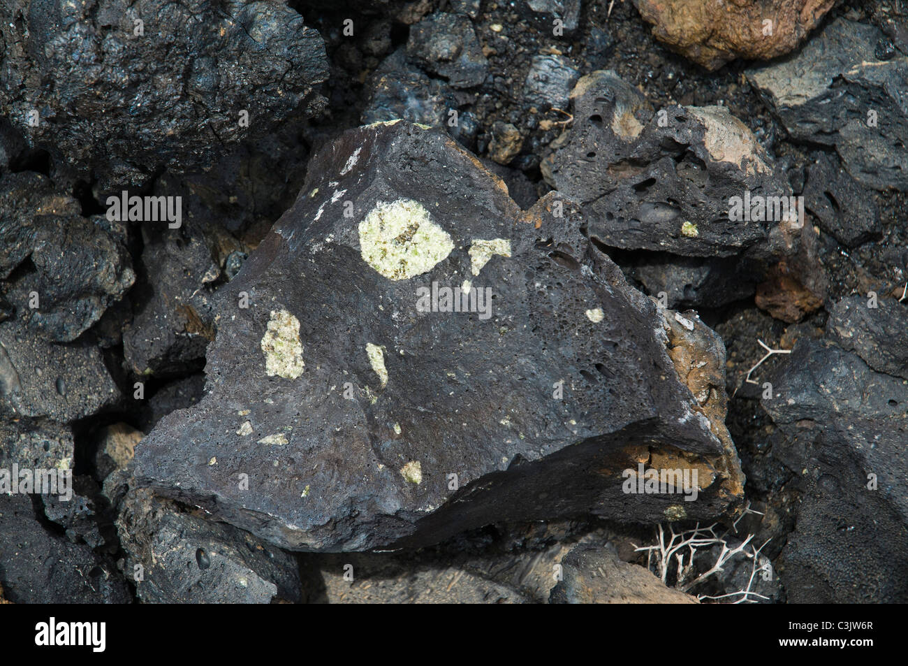 dh  VOLCANO LANZAROTE Volcano lava stones with olivine gem stone crystals Stock Photo