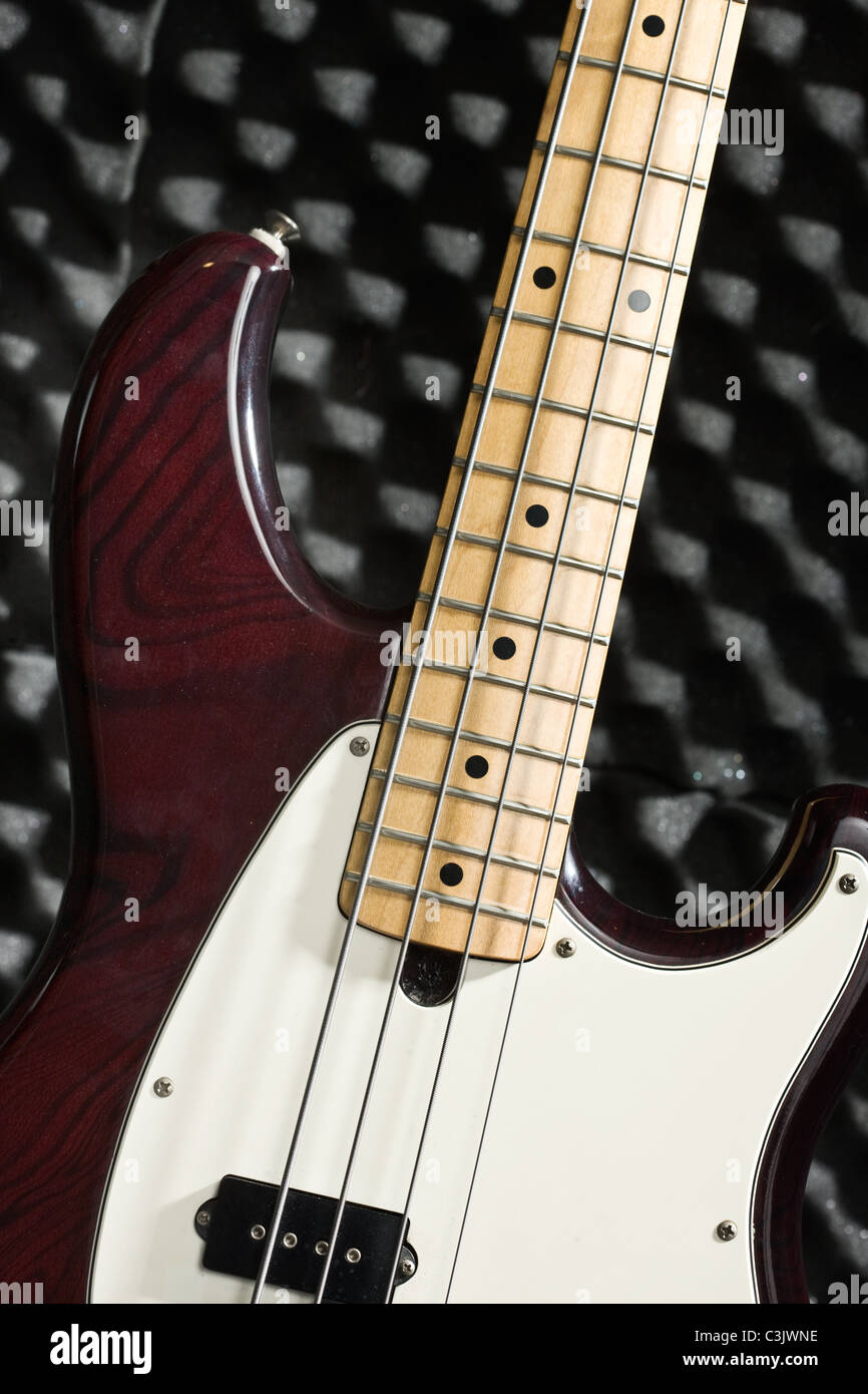 Germany, Electric bass guitar in music studio Stock Photo Alamy