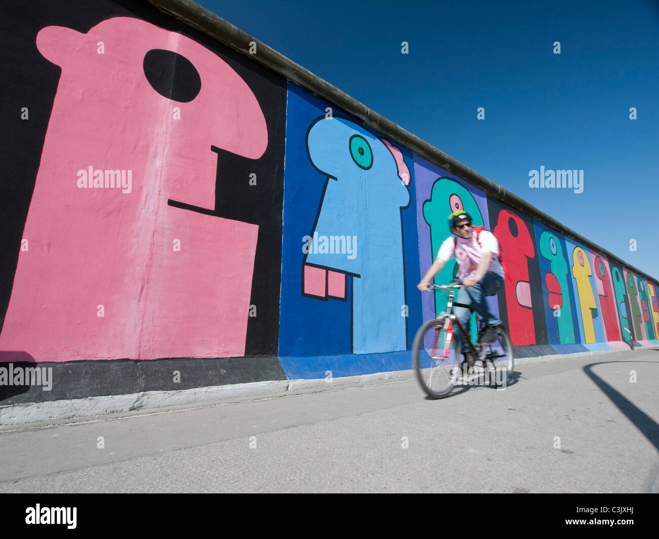 Murals painted on original section of Berlin Wall at East Side Gallery