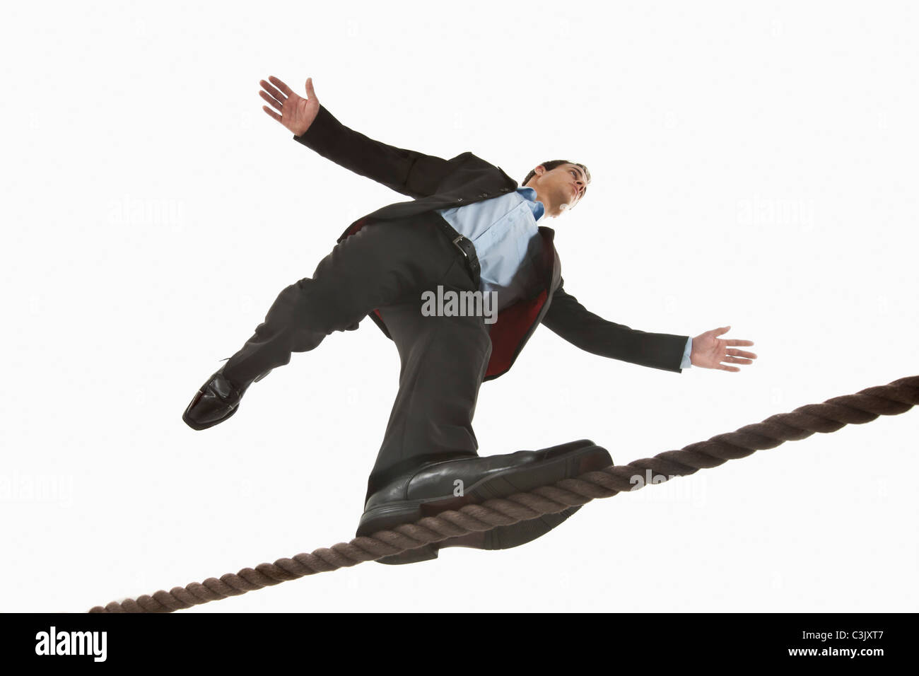 Businessman balancing on tightrope people hi-res stock photography