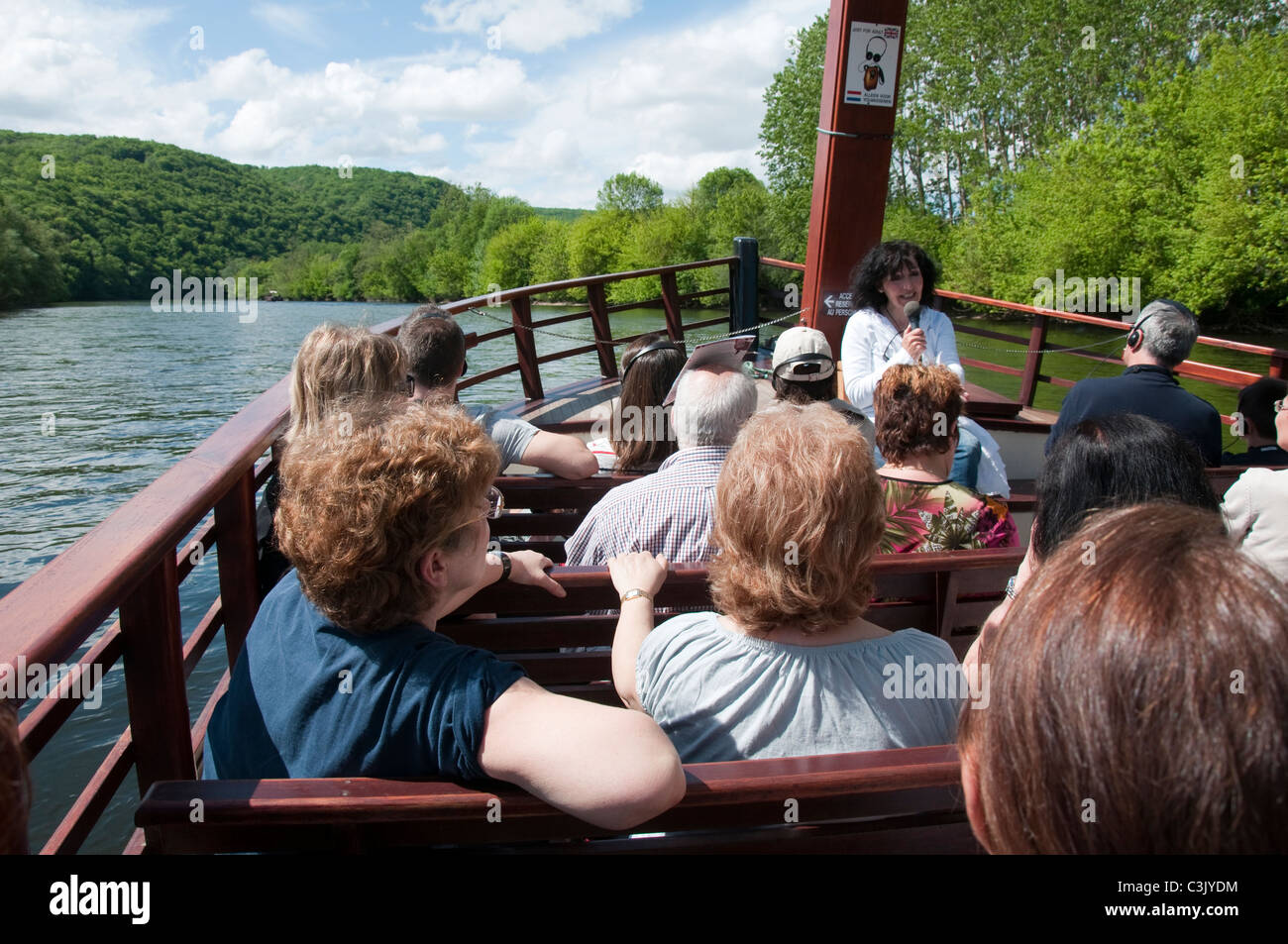 Tourists on a boat trip on the Dordogne River near La Roque Gageac, Dordogne France EU Stock Photo
