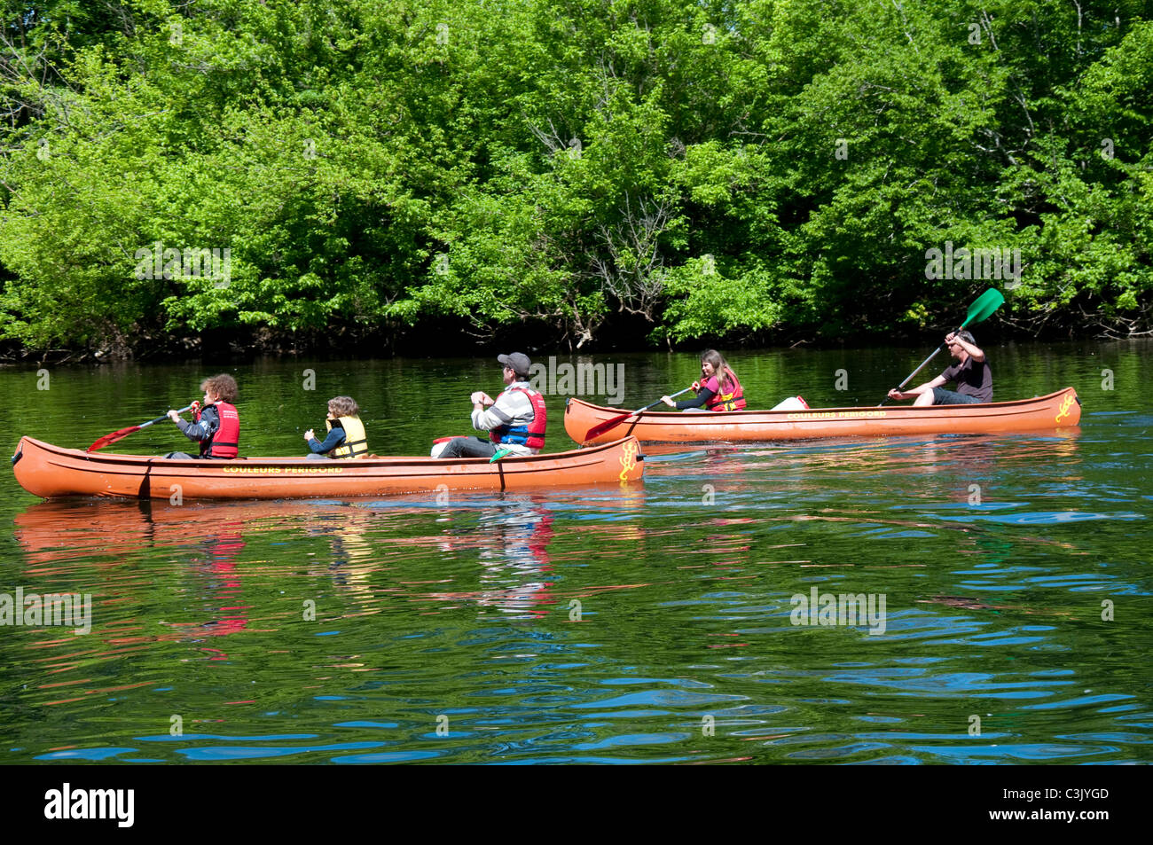 Canoes on the Dordogne River near La Roque Gageac, Dordogne France EU Stock Photo